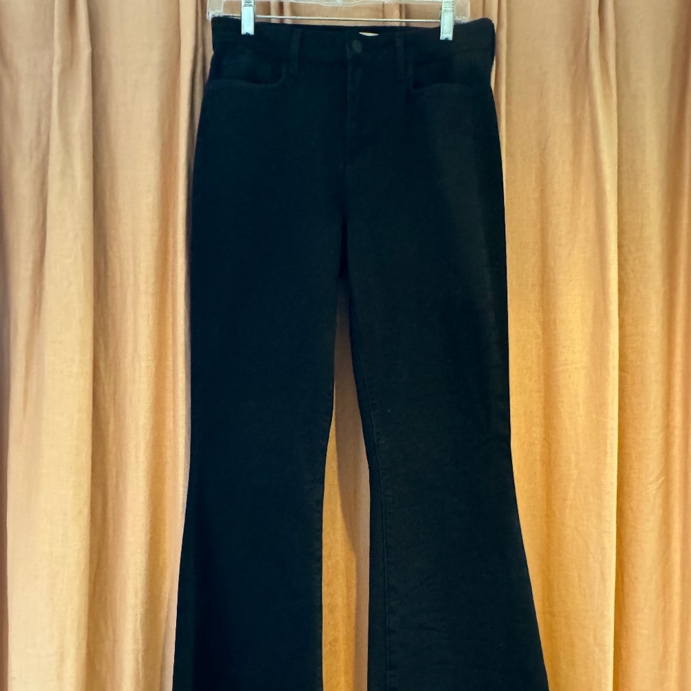 L'Agence "Marty" flared-leg jeans in black wash denim